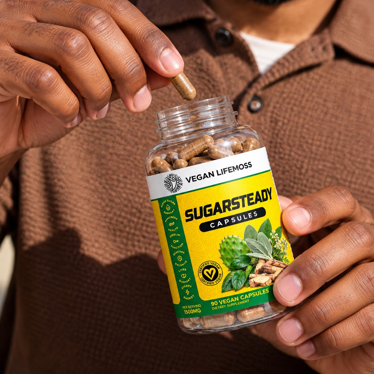 Hand taking a SugarSteady capsule from an open bottle