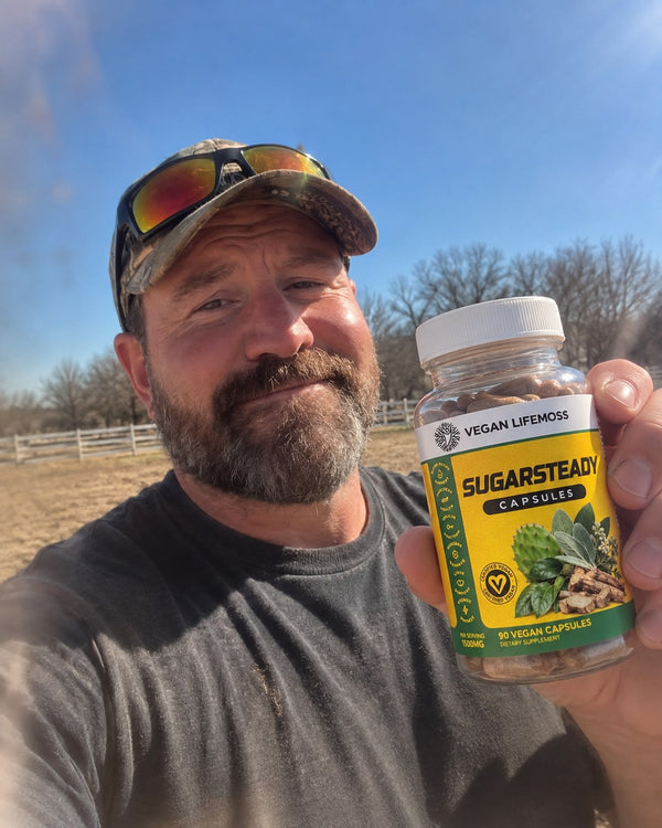 Customer holding a bottle of SugarSteady Capsules