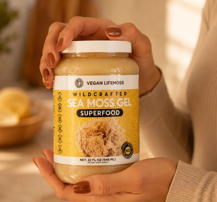 Hands holding a jar of Sea Moss Gold Gel
